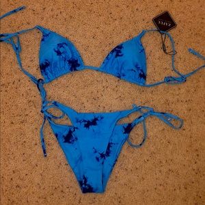 New with tags. Fits more like a medium